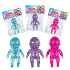 Three colorful baby dolls in packaging on a white background