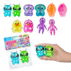 Colorful squishy toys with packaging and a hand holding two toys on a white background