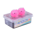 Pink slime balls in a clear container with a label on a white background
