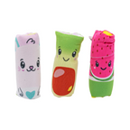 Three colorful plush toys shaped like a cat, banana, and watermelon on a white background
