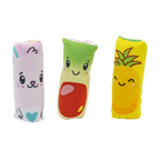 Three plush toys shaped like a cat, apple, and pineapple on a white background