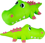 Two green alligator toys with pink undersides on a white background