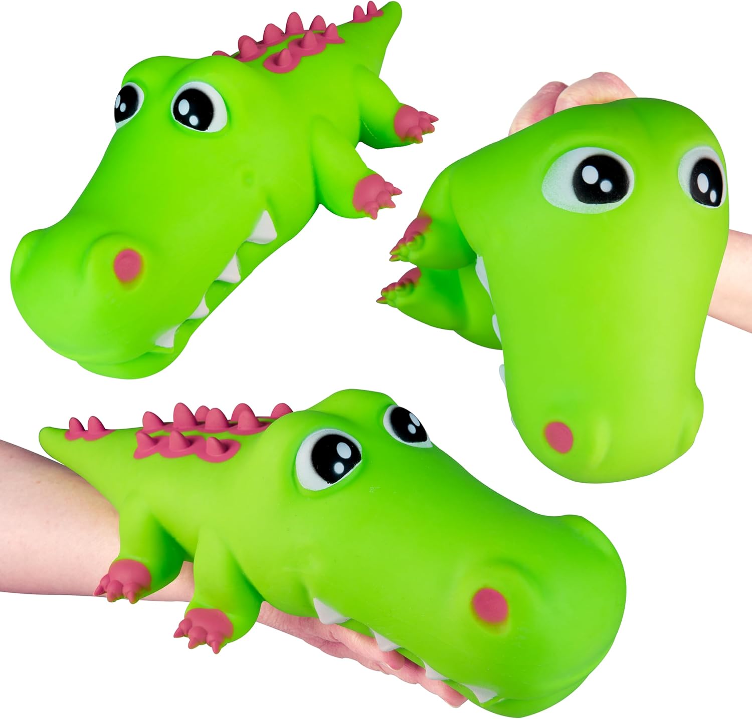 Green alligator-shaped toy with pink details on a white background