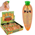 Squishy carrot toy with packaging and a hand squeezing it.