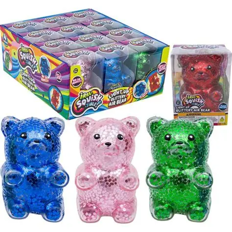 Four colorful glittery air bear toys in red, blue, pink, and green with their packaging.