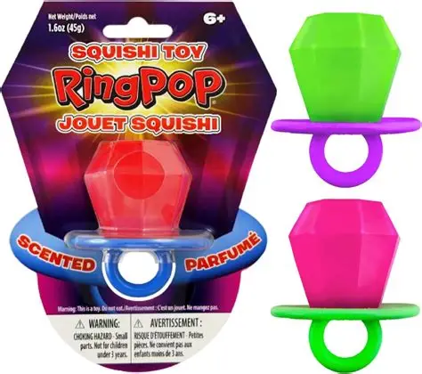 Squishi Toy Ring Pop scented in colors red, green, and pink of white background. 