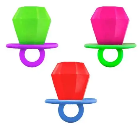 Three Ring pop sqquishy toys on white background in the colors red, green, and pink. 