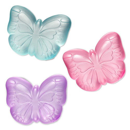 Three butterfly-shaped squishies in blue, pink, and purple on a white background