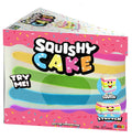 Box of Squishy Cake with colorful design and text on a white background