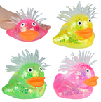 Four colorful light-up duck toys with spiky hair on a white background