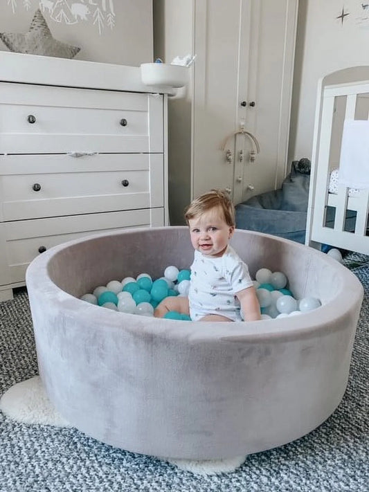 Luxurious Grey Velvet Ball Pit with 200 Aqua, White, & Grey Balls for Endless Fun