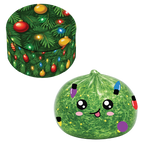 A Christmas-themed squishy toy and matching storage container. The squishy is a green, textured Christmas tree shape with a cute cartoon face, pink cheeks, and colorful hanging Christmas lights.