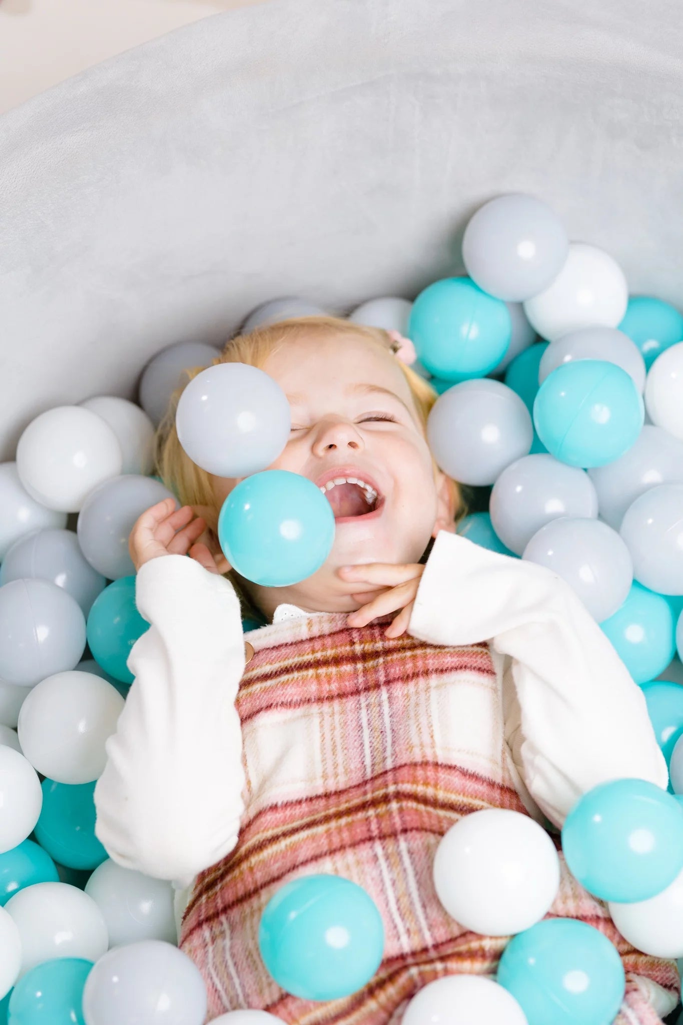 Luxurious Grey Velvet Ball Pit with 200 Aqua, White, & Grey Balls for Endless Fun