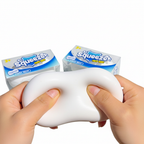 Two hands squeezing soap stress toy showing extreme softness