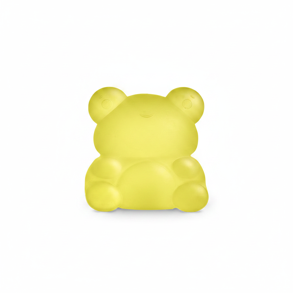 Yellow Frog Sugar Squisher squishy slow-rise stress toy on white background