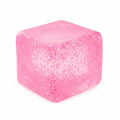 Pink glitter squishy cube sensory stress toy with sparkly glitter inside, white background