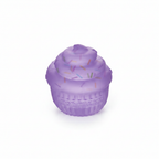 Purple cupcake squishy toy on white background