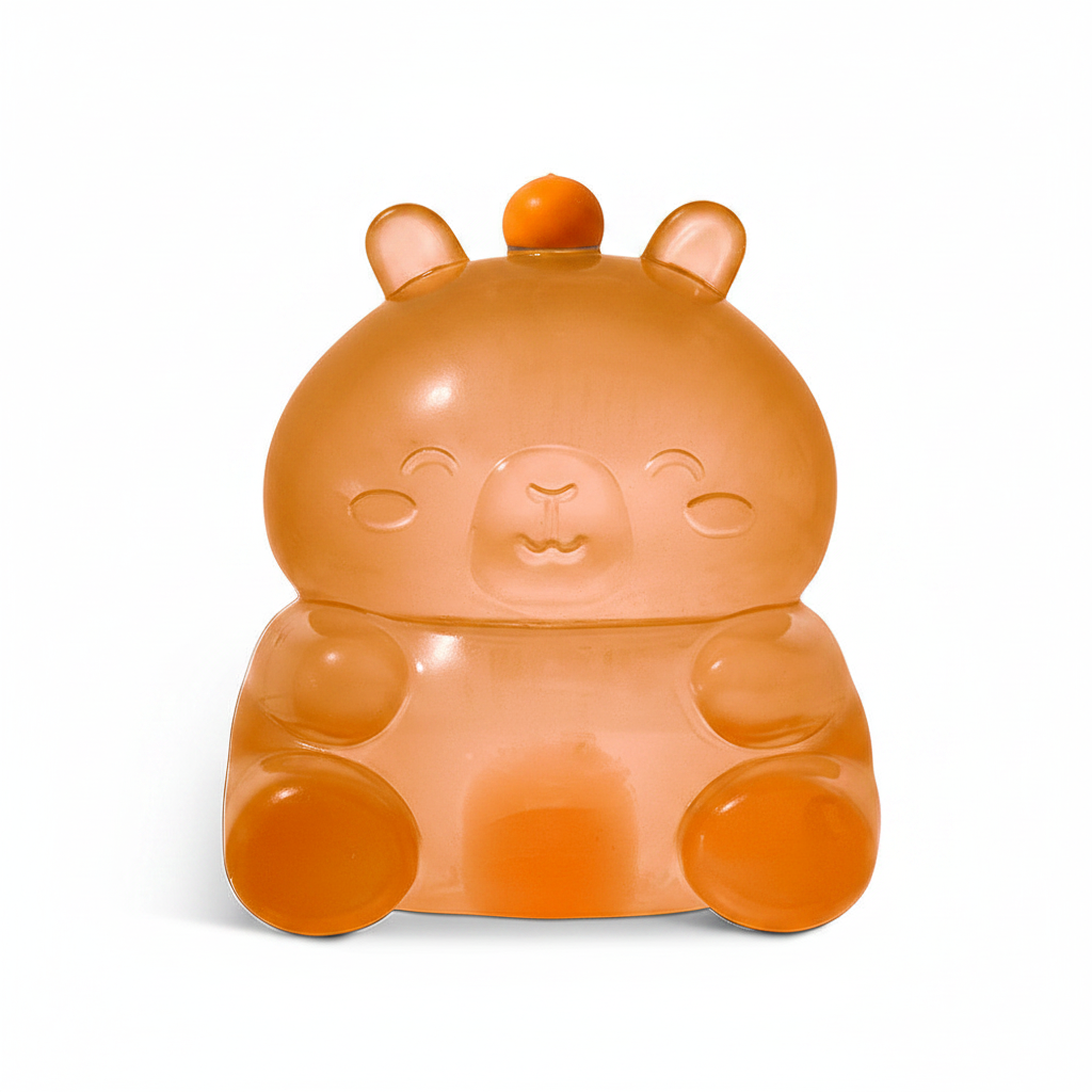 Orange capybara squishy toy on white background
