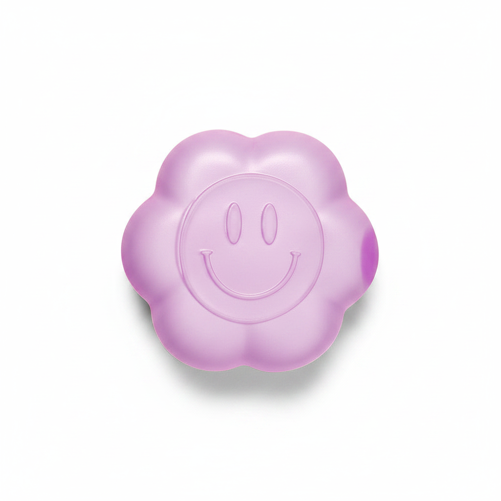 Purple daisy squishy toy with smiley face on white background