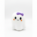 Crazy Fun Ghost Squishy with purple bow in retail box — white ghost character with orange cheeks, ages 6+