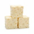 Four cheese block squishy toys stacked in a pyramid