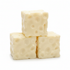 Four cheese block squishy toys stacked in a pyramid