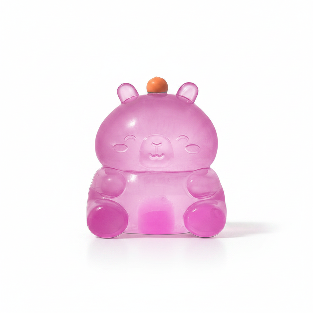 Pink capybara squishy toy on white background