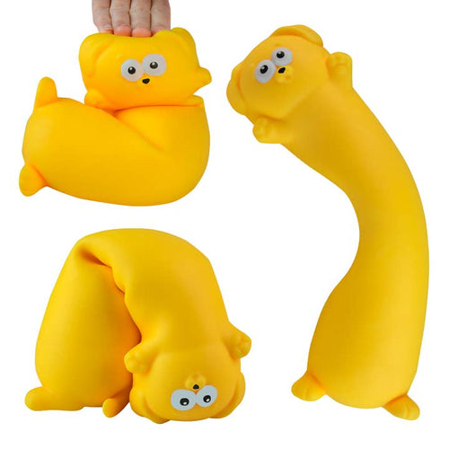 Yellow squishy toy with a face on a white background